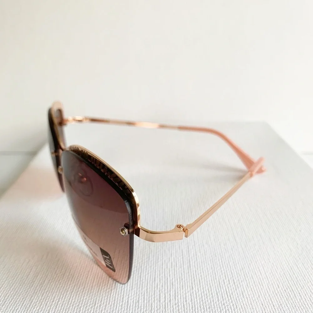 NWT pink and rose gold semi rimless sunglasses
